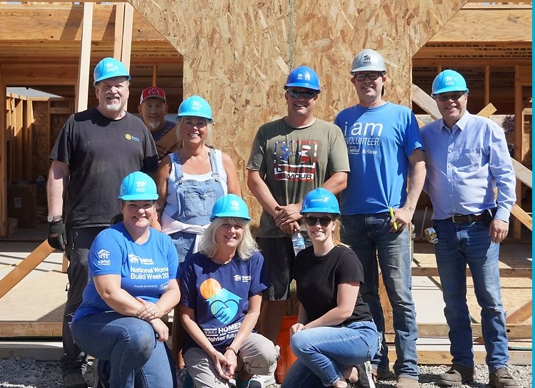 Habitat for Humanity volunteers at home construction site