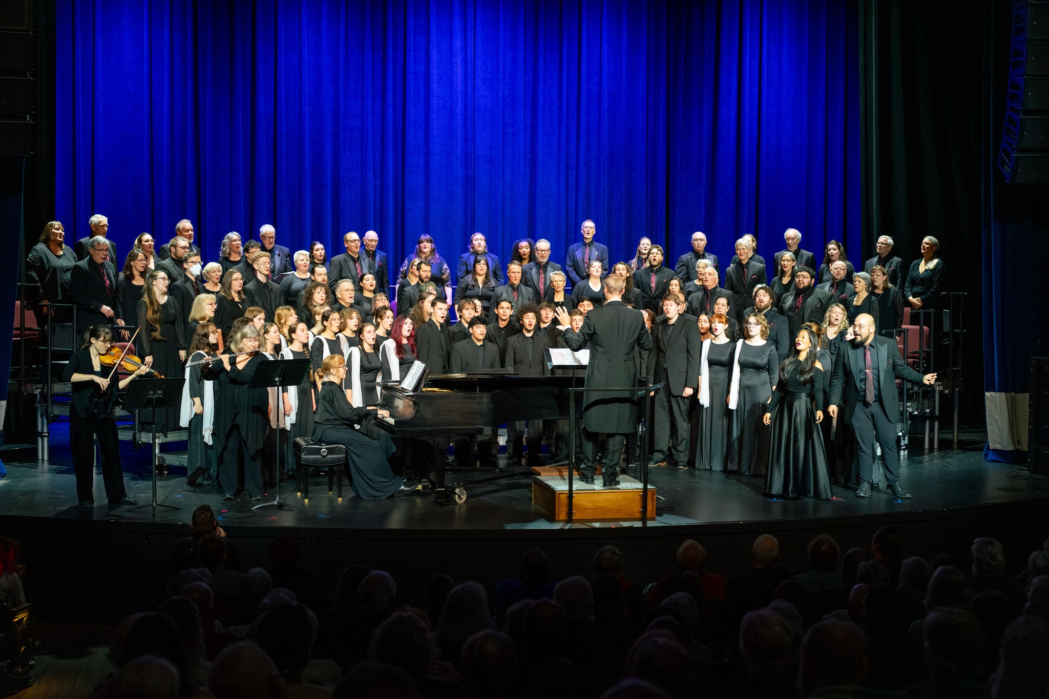 Southern Oregon Repertory Singers performing on stage at SOU music hall in Ashland, Oregon