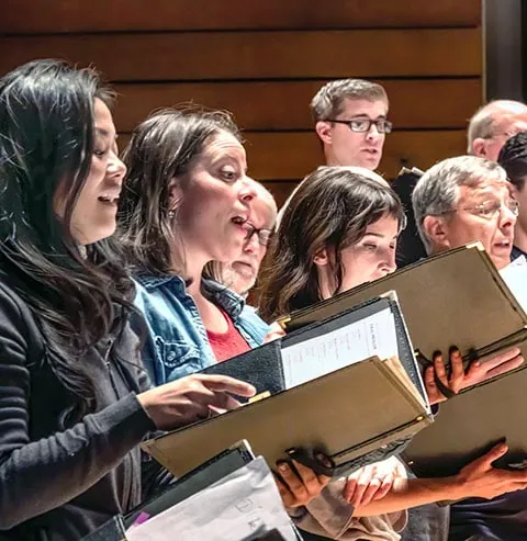 singers rehearsing