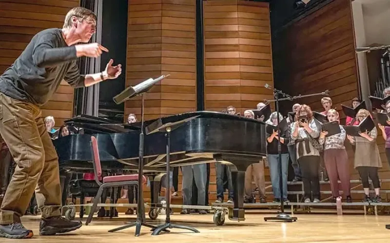 Music Director Paul French rehearses the Southern Oregon Repertory Singers for a concert at the SOU Music Recital Hall