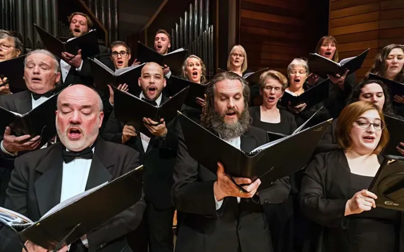 section of the Southern Oregon Repertory Singers singing during a live concert at SOU Music Recital Hall